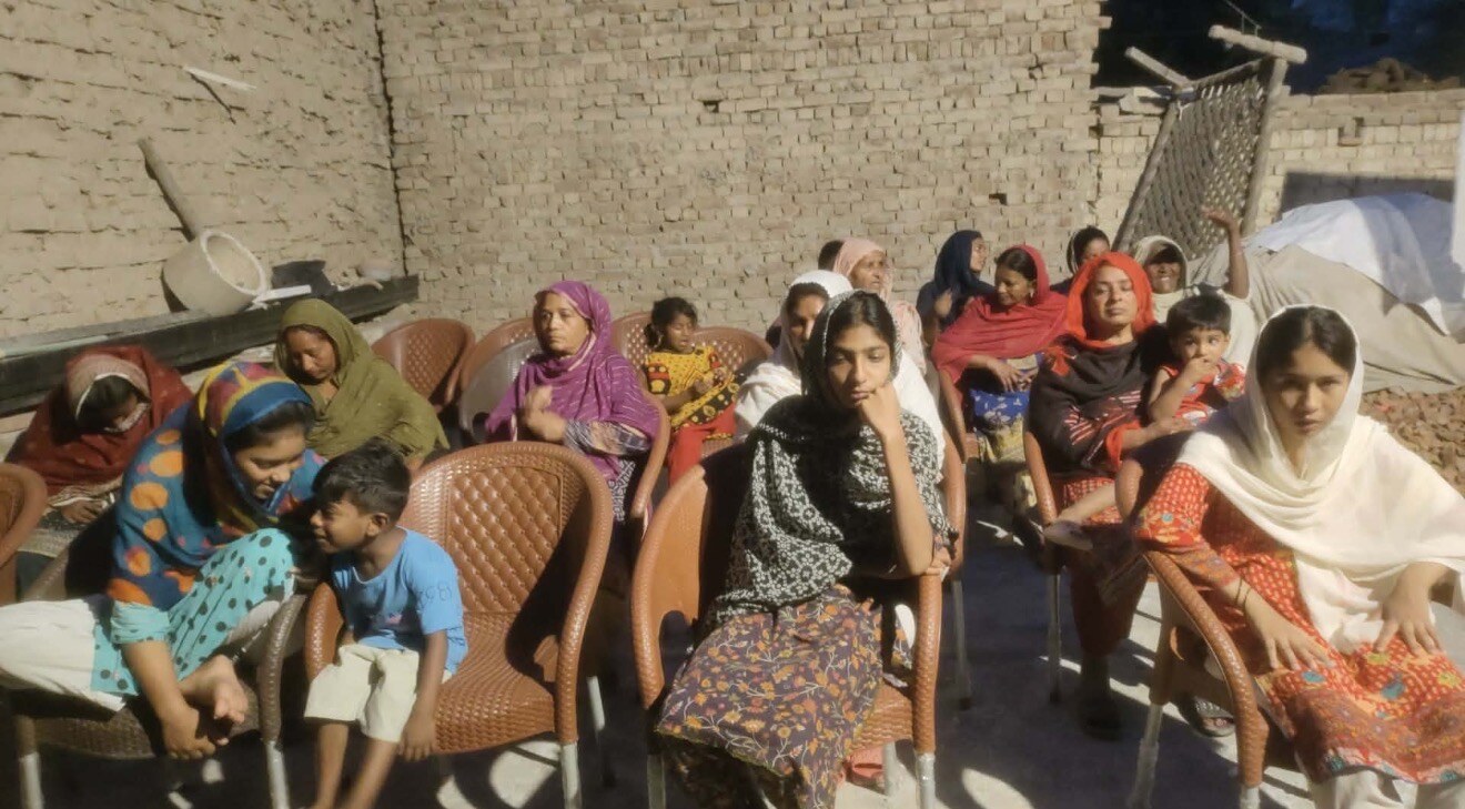 Women and children gathered together in Pakistan